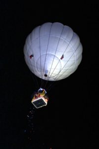 The oldest form of flight--balloon and the basket--fascinates many people. Philip Bryant and Mike Emich drop confetti as they take off. Photo courtesy: Kim Vesely, America's Challenge