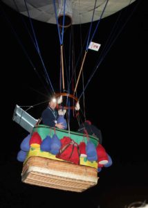 Noah Forden about to drop a sand bag to rise higher. He launched with Bert Padelt.