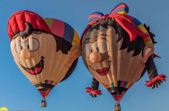 Laura LeAnne Adams' balloons "girl/wife" and "boy/husband"